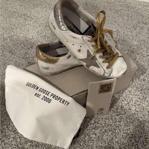 Golden Goose Women's Sneakers in White and Gold